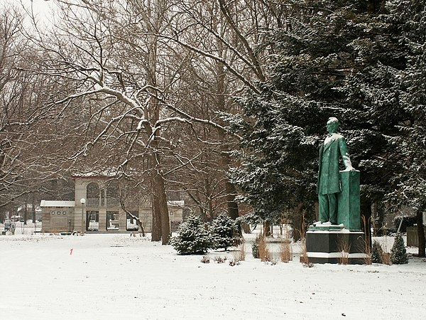 A snowy day in Carle Park west of Urbana High School. On the right is Lincoln the Lawyer, a statue of Abraham Lincoln by Lorado Taft.