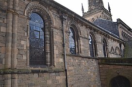 Norman chancel extern north facade (note grotesque corbels and arches)