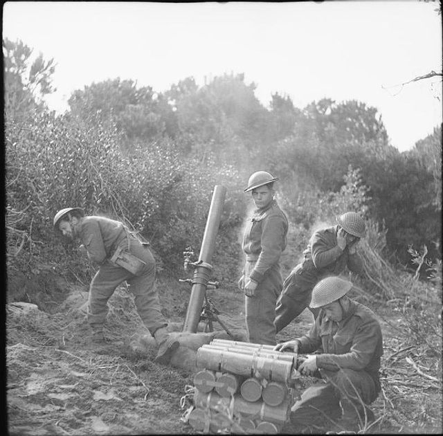 4.2-inch mortar of 15th Brigade Mortar Support Company in action in the Anzio bridgehead, Italy, 16 March 1944.