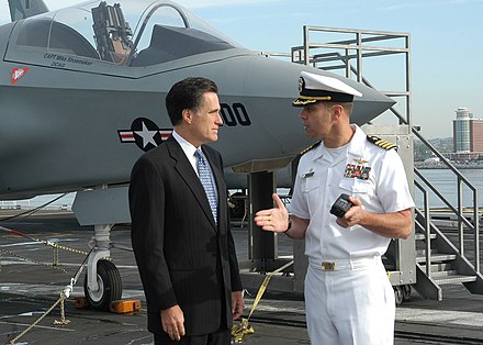 Governor Romney received a tour of the aircraft carrier USS John F. Kennedy on May 20, 2005, as part of celebrating Armed Forces Day