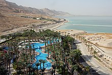 Ein Bokek resort on the shore of the Dead Sea View from the David Hotel, En Bokek (34352751122).jpg