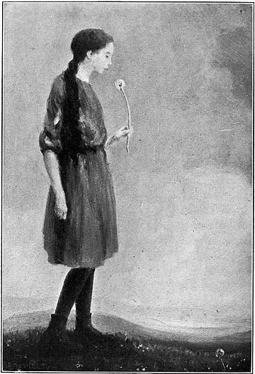 Girl holding dandelion puff