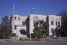 A fire in 1958 left the building with a flat roof until 1989. Wilkes County, Georgia Courthouse in 1969.jpg