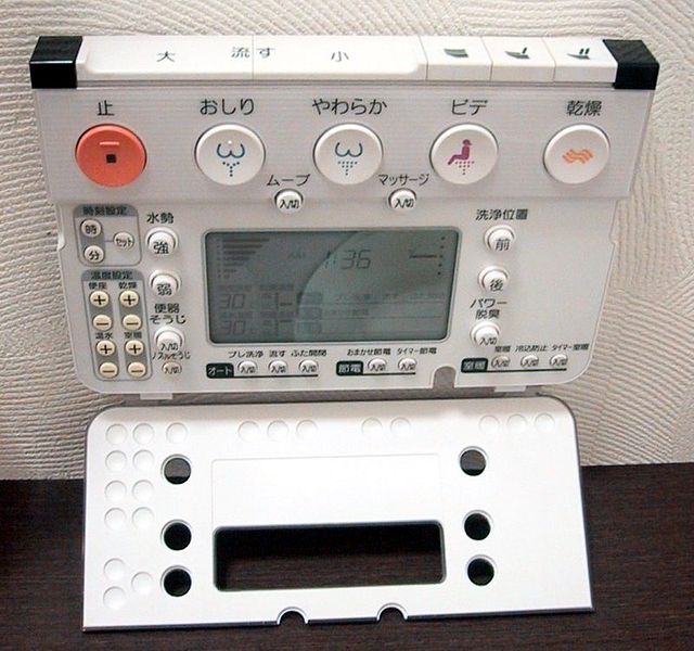 a wireless toilet control panel for a japanese toilet with 38 buttons