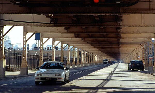 The Green Line elevated tracks run above Lake Street in Chicago. April 2002