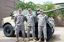 Members of the 203rd in front of the battalion's Panhard AML-90 203rd MI BN Panhard AML.jpg