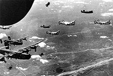 Formation of 450th Bomb Group B-24s flying through flak 450bg-2.jpg