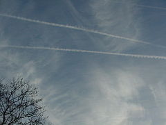 Airliner contrails, some new, some old, dispersed by wind shear