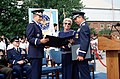 Air Force Chief of Staff Gen. Larry D. Welch presents a retirement certificate to Gen. Duane H. Cassidy.jpg