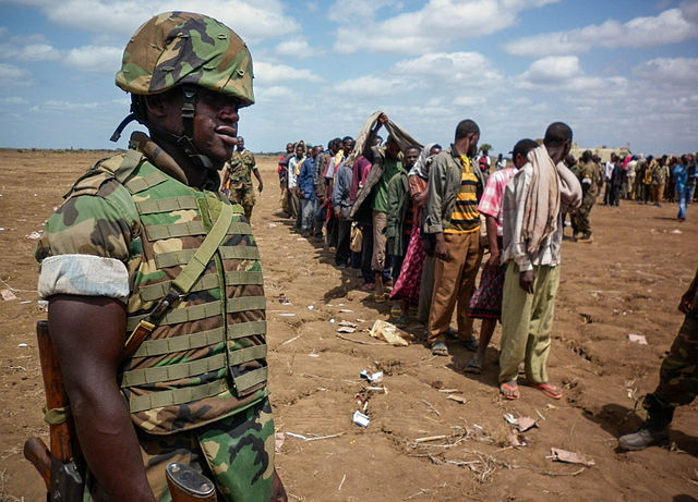 https://upload.wikimedia.org/wikipedia/commons/thumb/8/84/Al_Shabaab_fighters_disengage_and_lay_down_arms_06_%288019358739%29.jpg/640px-Al_Shabaab_fighters_disengage_and_lay_down_arms_06_%288019358739%29.jpg
