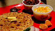 Thumbnail for File:Aloo Parantha Makkhan Maar Ke.JPG