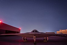 The first B-21 at Northrop's Plant 42 in Palmdale, California in November 2022 B-21 Plant 42 night.jpg