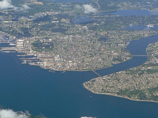 Sinclair Inlet and Puget Sound Naval Shipyard (left), Dyes Inlet (middle distance) and Manette and Warren Avenue Bridges (left to right) across Port W