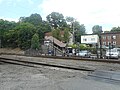 Shot of the parking lot on the NW corner of US 6 and Ellen Avenue from across the tracks.