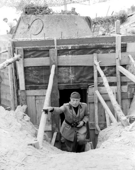 Mussolini inspecting fortified positions, 1944