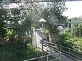 A walkway from the eastbound platform to Garden Lane & Carle Place Park.