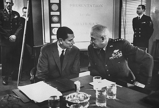 Secretary of Defense Thomas S. Gates Jr. with Chairman of the Joint Chiefs of Staff General Nathan F. Twining during Senate Armed Services Committee hearing at Capitol Hill 1960. Both Gates and Twining agreed for the need of the new procedures to coordinate a new nuclear strike plans in order to prevent the first-strike and strength the United States deterrence against the United States adversary. Gates and Twining later-on coordinated the creation of the Joint Strategic Planning Staff and also the Single Integrated Operational Plan. These two functions plan played major role during the Cold War.[7]