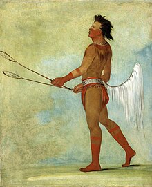 Tul-lock-chish-ko, or "Drinks the Juice of the Stone," dressed for the sport of stickball. Painting by George Catlin, Skullyville, 1834. Choctaw Stickball Player, Painted by George Catlin, 1834.jpg