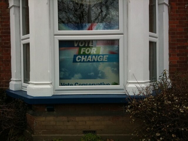 An election sign in a residential property.