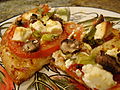 Cornmeal Pizza with Rice Mozzarella and Layered Tomato, Scallion, Tofu Feta and Mushroom (4433846199).jpg