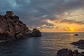 La tour génoise de Porto au soleil couchant