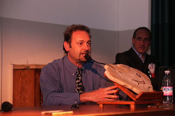 Cristiano Dal Sasso with a cast of the type specimen in 2012