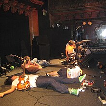 Deerhoof performing in 2009 Deerhoof on stage.jpg