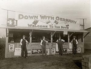 World War I, circa 1915. Free cigarettes for soldiers at Valcartier military base near Quebec City, Canada Down with Germany - Welcome to the Boys.jpg