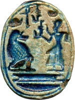 Amulette scarabée de Ramsès II représentant Thot comme un babouin assis.