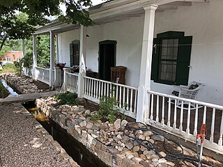 El Zaguan, Santa Fe, west patio with restored acequia adjacent to the garden