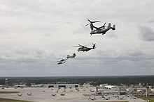 From right, a V-22 Osprey, a CH-53E Super Stallion, a CH-46 Sea Knight, a UH-1N Huey, and an AH-1 Cobra fly in formation over Marine Corps Air Station New River, North Carolina, March 18, 2008. Formation over MCAS New River 2008.jpg