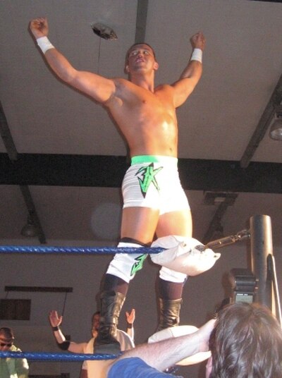 Kazarian posing on the turnbuckle before his match at a PWG show