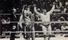Koloff (right) and Sheik (left) celebrate winning the WWF Tag Team Championships with manager Blassie (center) Freddie Blassie, Nikita Koloff and Iron Sheik WWF Tag Champions Wrestlemania.png