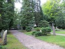 Graves from the old cemetery, tomb of the couple Görrissen with the Sphinx in the background (old cemetery, Flensburg) .JPG