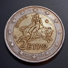 Greek 2 Euro coin 2002 featuring the word Europa and depicting a woman sat astride a bull.