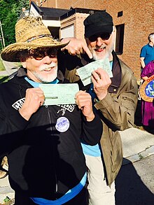 Cromwell and J. G. Hertzler show their arrest citations at the Crestwood station protest, 2016 HERTZLER CROMWELL ARRESTED.jpg