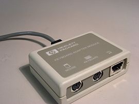 HP HIL Adapter, which allows standard PC keyboards and mice to be added to an HIL host. Note the pass-through port on the right, which allowed other HIL devices to be daisy-chained through this one. Hp hil adapter.jpg