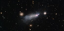 SBS 1415+437 is a WR galaxy located about 45 million light-years from Earth. Hubble View- Wolf-Rayet Stars, Intense and Short-Lived (18731205164).jpg