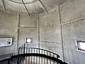 Interior view of Gibbs Hill Lighthouse showing the cast iron plates of the outer wall.