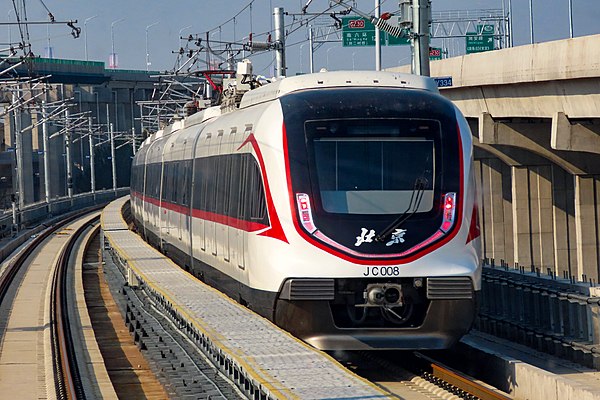 A Daxing Airport Express train passing Beiwangchang Village, Panggezhuang Town