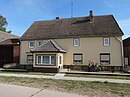 Wüstenhagen farmstead, consisting of a residential house, gatehouse, left and right stable building and barn