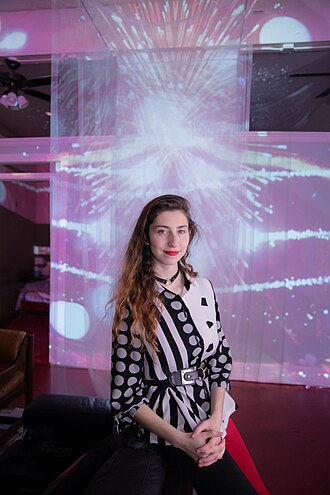 Kira Bursky at the opening night of her film installation "Considerations of Infinity." Kira Bursky - Considerations of Infinity.jpg