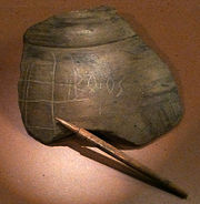 Pottery sherd with inscription and stylus Manching Tonscherbe BOIOS.jpg