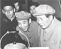 Mao Zedong and Wang Renzhong on a methane exhibition.jpg