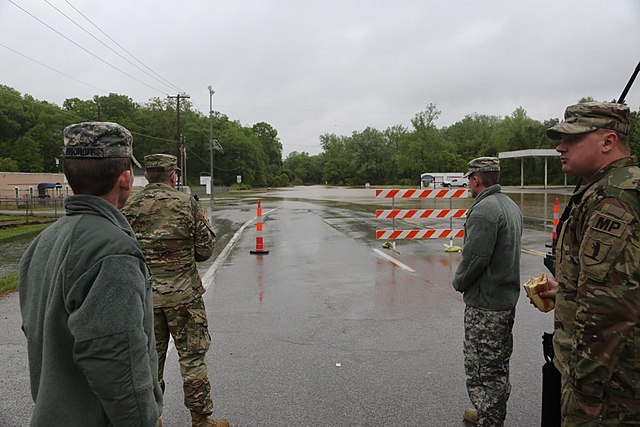 Missouri Army National Guardsmen of the 1175th Military Police Company maintain traffic control points on flooded roads in Missouri’s Jefferson County