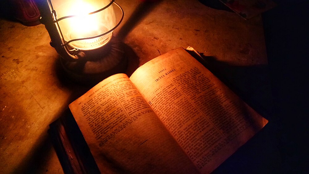 The Bible, a book in which God’s will and word are recorded