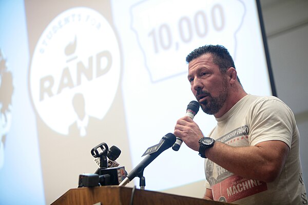 Miletich speaking at St. Ambrose University in Davenport, Iowa.