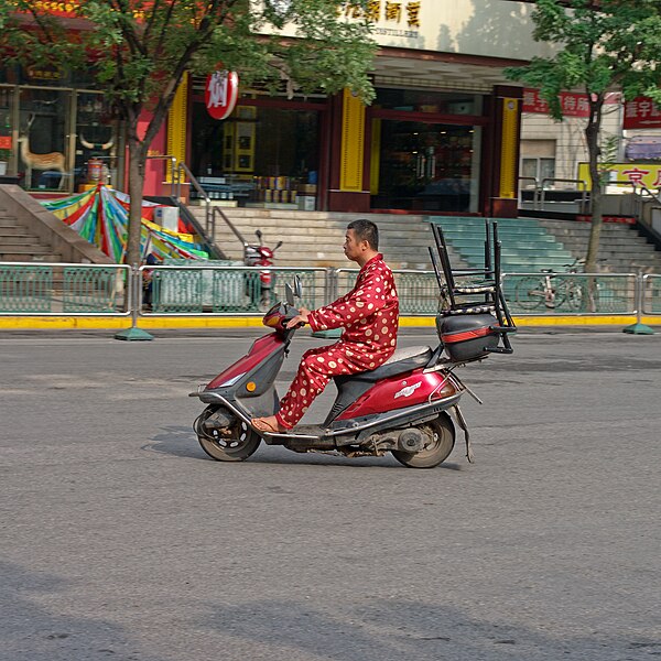 File:Pijama on a motorbike.jpg