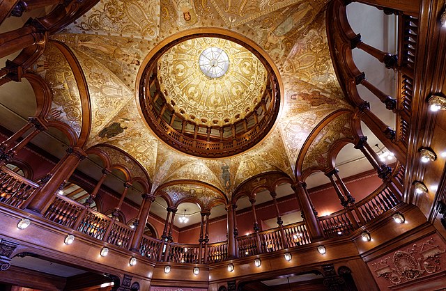 An interior view of the hotel's rotunda and ceiling mural.