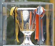 The 2019 AFL Premiership Cup on display at the 2019 AFL Grand Final Parade Premiership Cup - 2019 Grand Final Parade.jpg